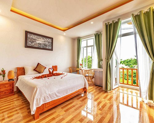 Room 2 — bright room with a balcony